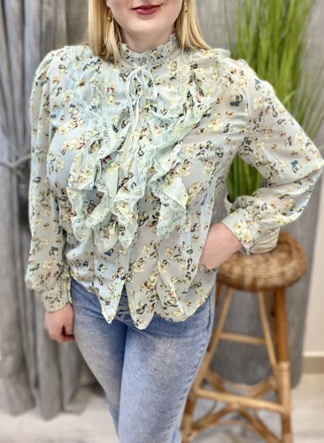 Bluzka damska w kwiaty z falbankami