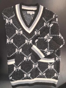 Sweter damski z kieszeniami wzór krata kokardki